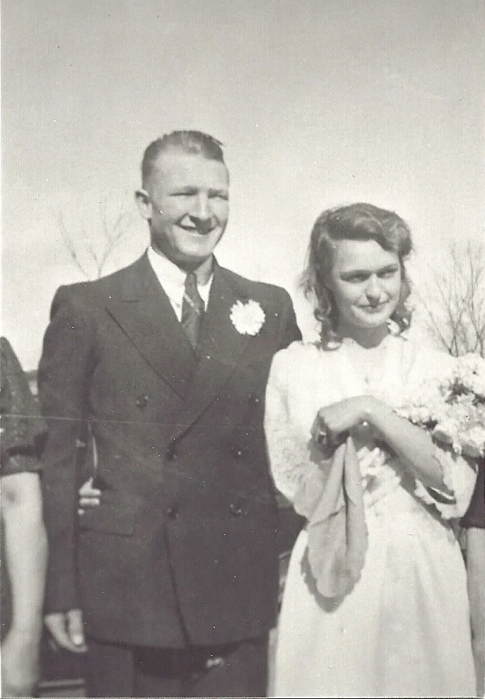 Archival black-and-white portrait of a couple in formal dress from the Hurry Back family collection